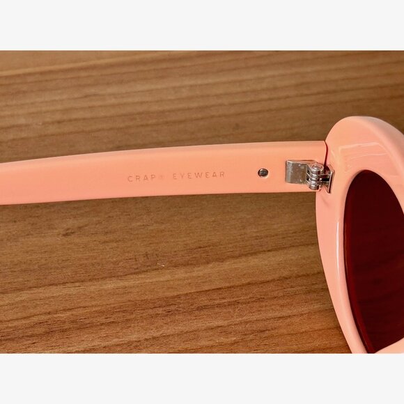 Crap Eyewear Pink Oval Frame Sunglasses with Red Lenses